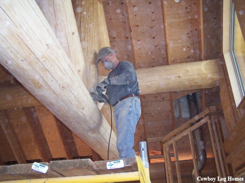 Log Home Hand Sanding Cowboy Log Homes