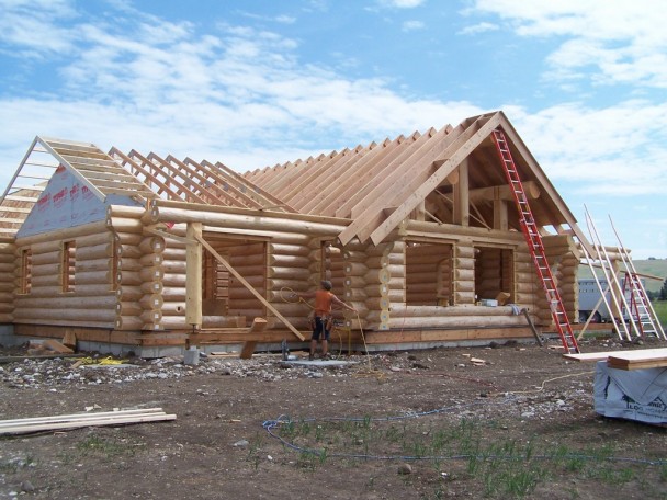 july 16th front  framing of handcraft log home