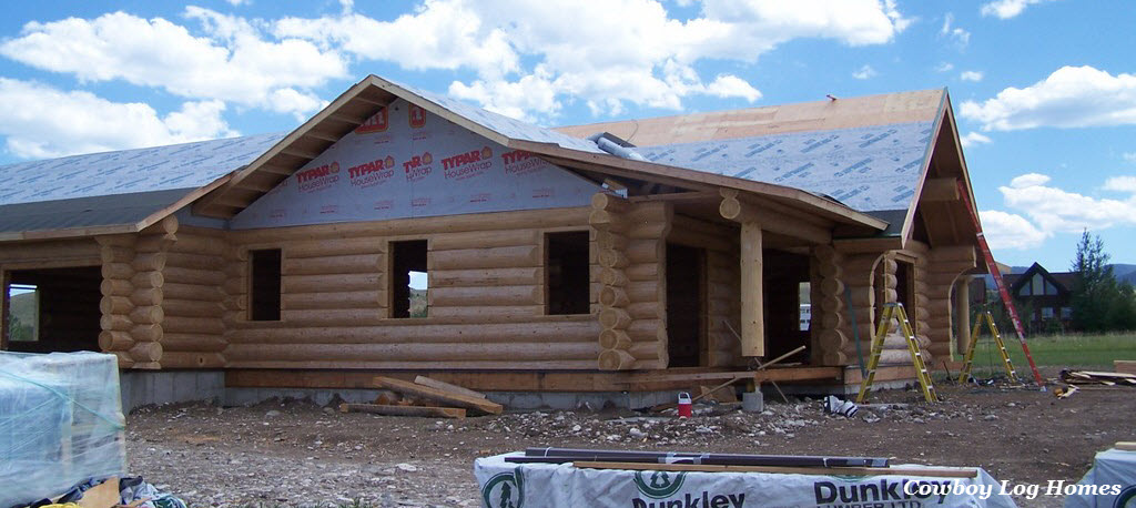 july 17th tar paper on garage and log home wing