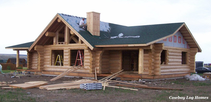 july 20th front of custom log home roofing finishing