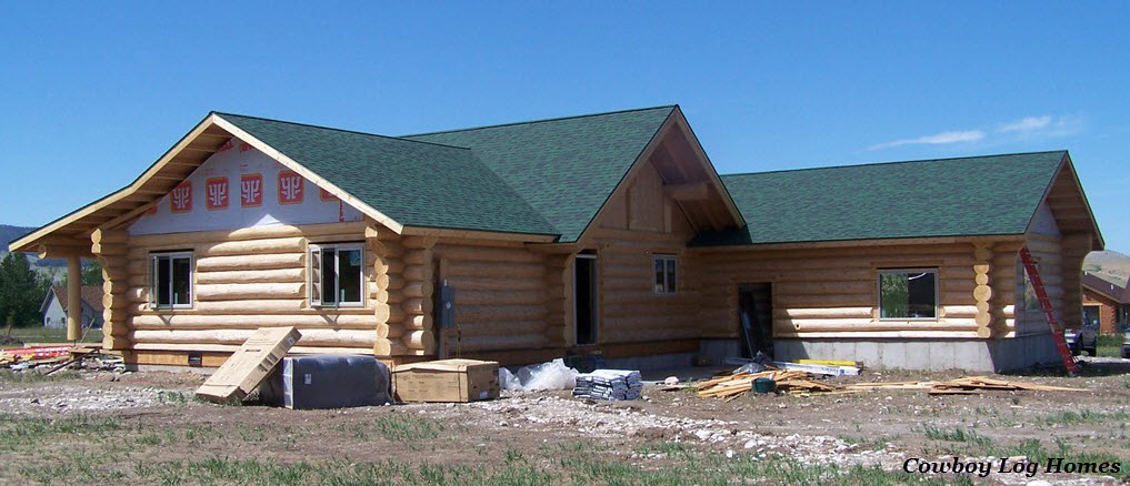 july 24th rear and side of log home