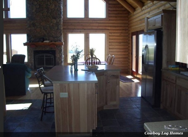 Swedish Cope log home kitchen and dining