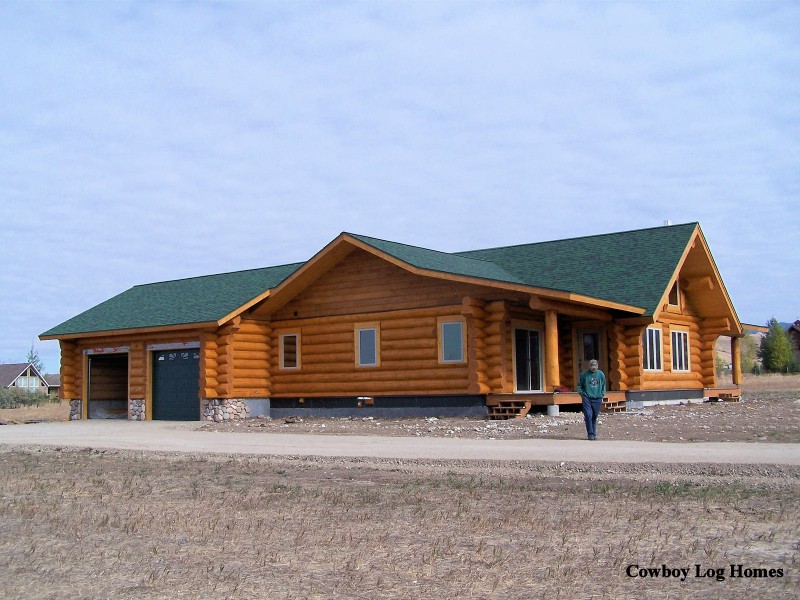 Handcrafted Log Home with Attached Garage Cowboy Log Homes
