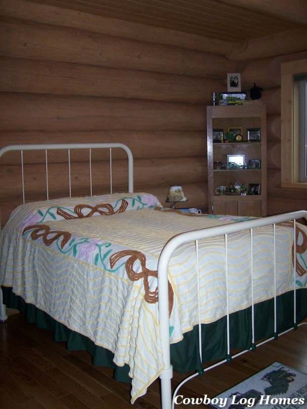 Bedroom of Handcrafted Log Home