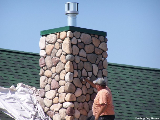 Stoning Chimney on Handcrafted Log Home