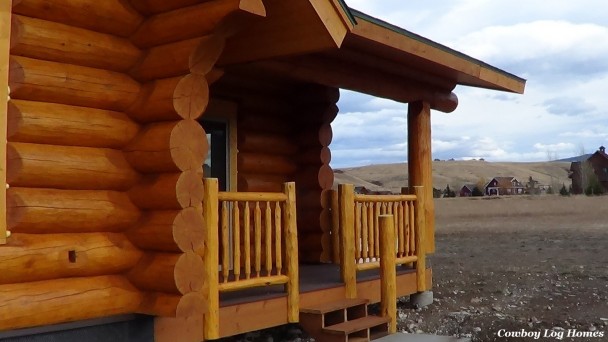 Handcrafted Log Railing on Covered Porch