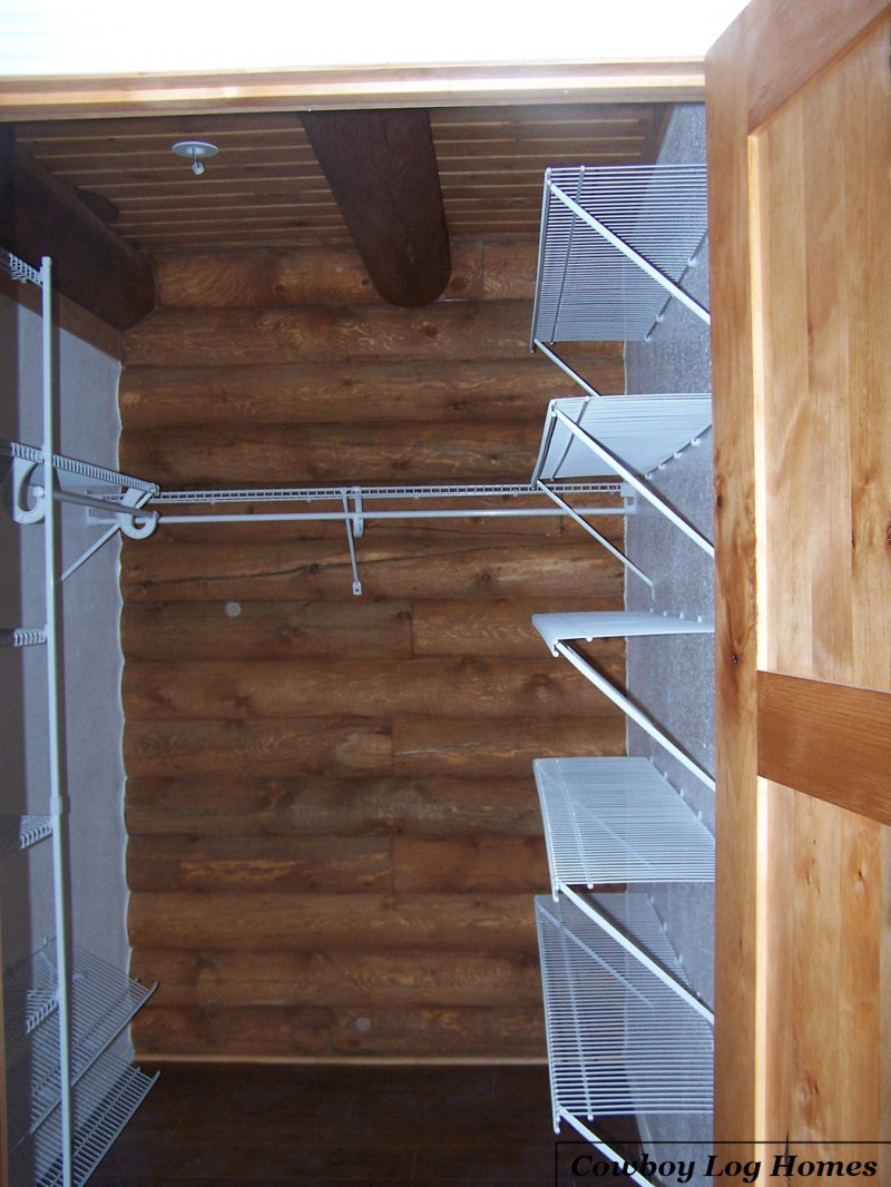 Walk In Closet in Log Home Master Suite | Cowboy Log Homes