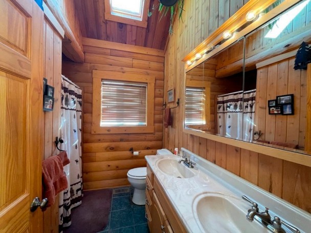 Log Home Bathroom with Double Sink