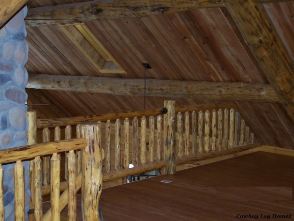 Log Cabin with Log Accents on Second Floor