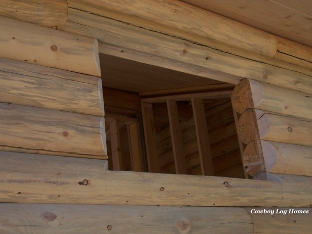 Bevel Cut Around Log Cabin Window Opening
