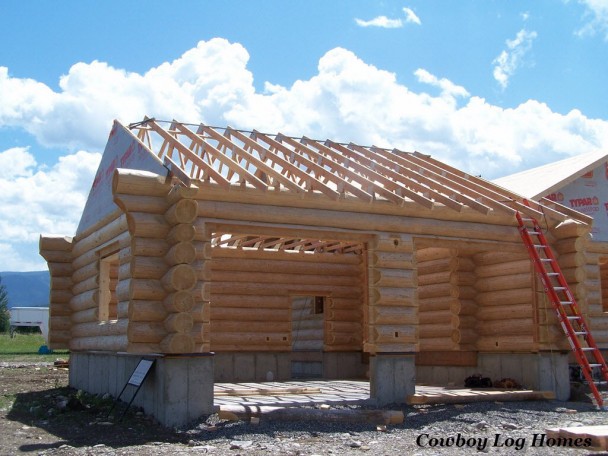 Handcrafted Log Garage with Standard Trusses