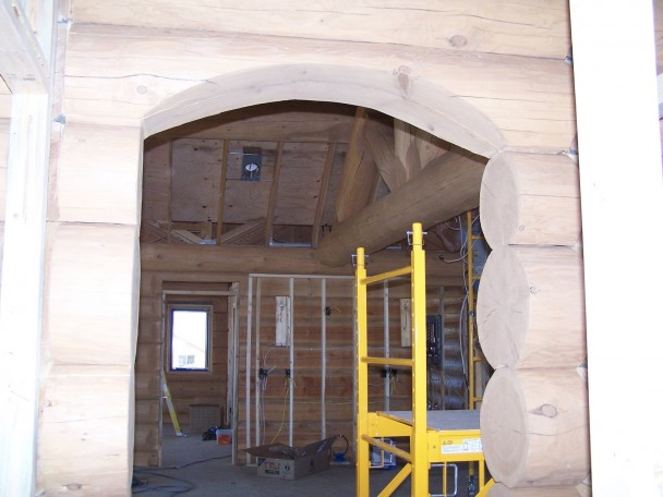 Handcrafted Log Home with Interior Log Archway