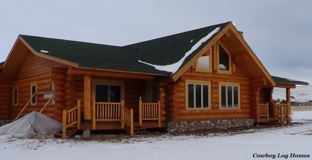 Handcrafted Log Home with Log Railing