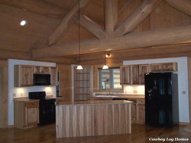 Log Home Kitchen in Handcrafted Log Home