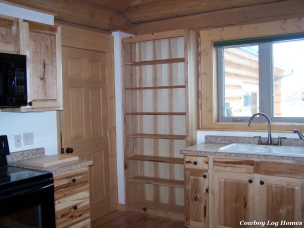 Handcrafted Log Home Kitchen with Hickory Cabinets