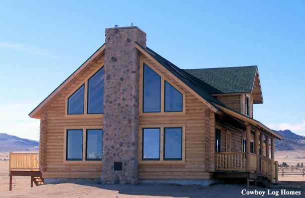 Stone Fireplace Centered on Gable End of Log Home