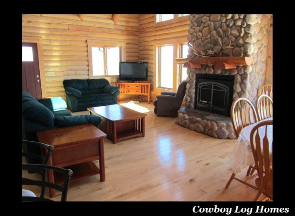 Great Room of Log Home with Stone Fireplace