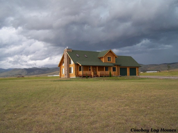 Log Home with Storm Brewing