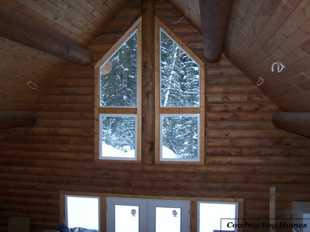 Interior of Stacked Log Gable End with Trapezoid Windows