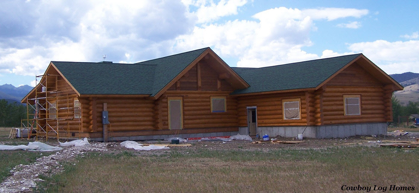 august 7th rear log home staining complete
