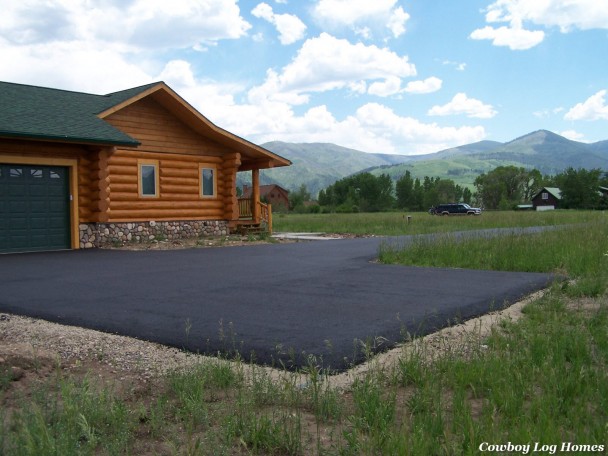 handcrafted log homes driveway paved